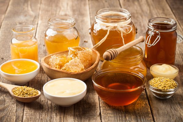 various honey on wooden table.jpg